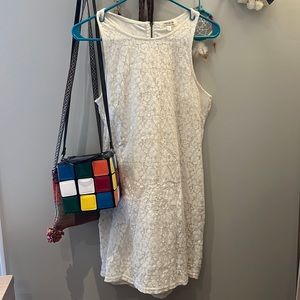 Sleeveless lace white shift dress